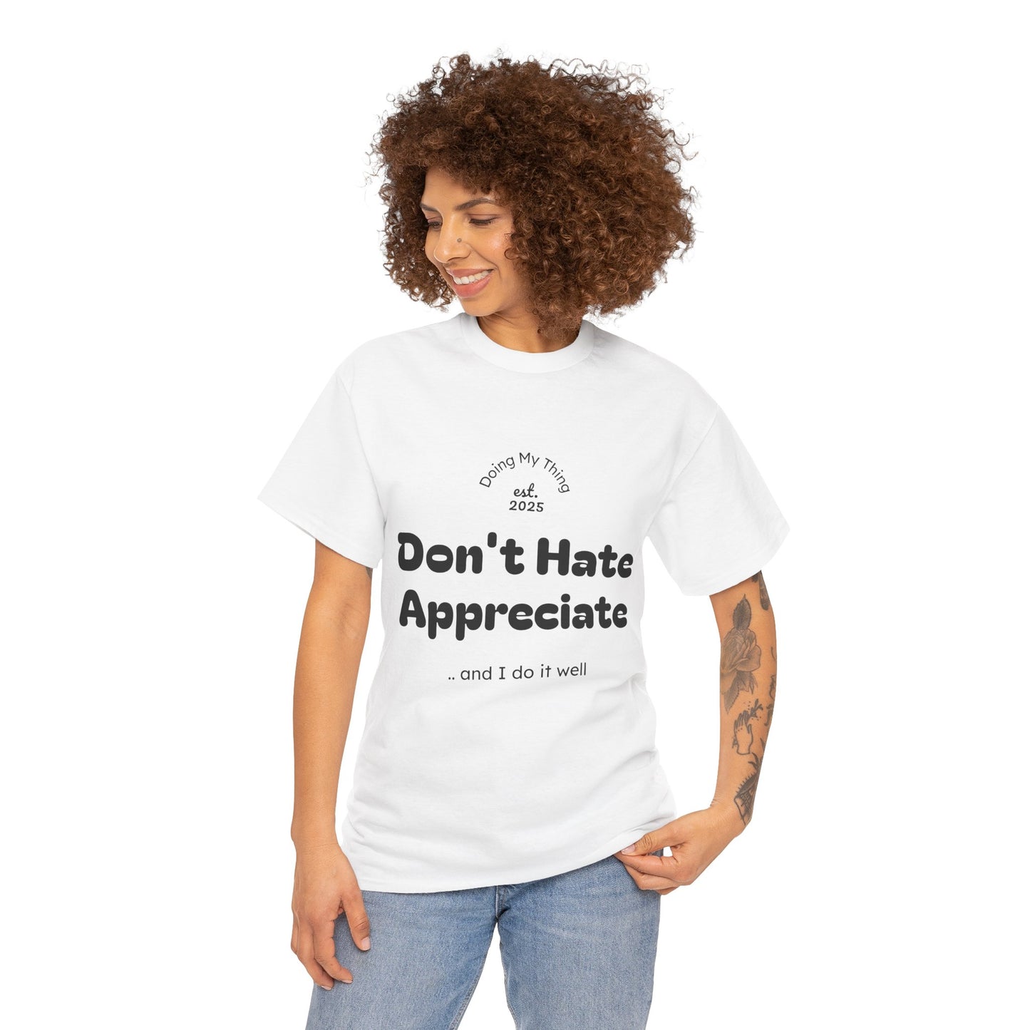 Woman wearing a Don't Hate white t-shirt on a white background