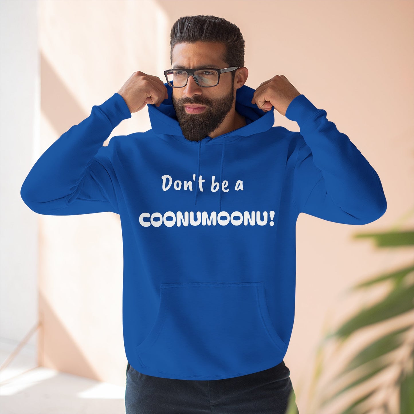 Playful Fleece Hoodie with Witty Text - Coonumoonu!