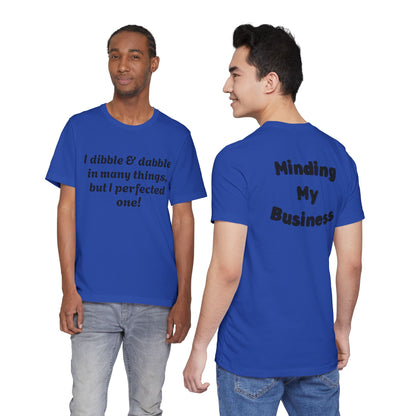 Minding My Business Tee — “I dibble & dabble in many things, but I perfected one!” Graphic T‑Shirt