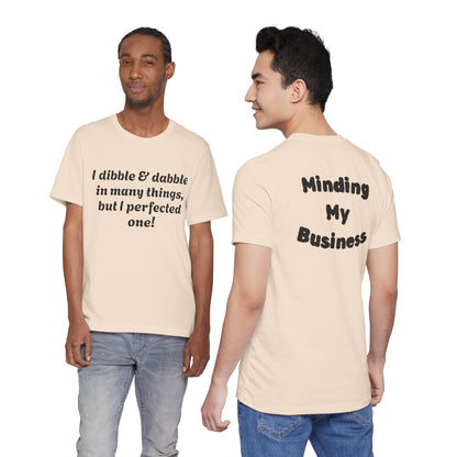 Minding My Business Tee — “I dibble & dabble in many things, but I perfected one!” Graphic T‑Shirt