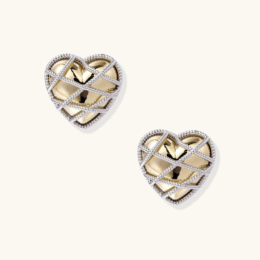 Heart-shaped stud earrings with intricate lattice design in 18K gold plated brass and silver-tone metal.