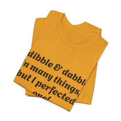 Minding My Business Tee — “I dibble & dabble in many things, but I perfected one!” Graphic T‑Shirt