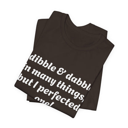 Minding My Business Tee — “I dibble & dabble in many things, but I perfected one!” Graphic T‑Shirt