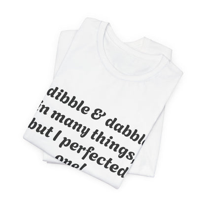 Minding My Business Tee — “I dibble & dabble in many things, but I perfected one!” Graphic T‑Shirt