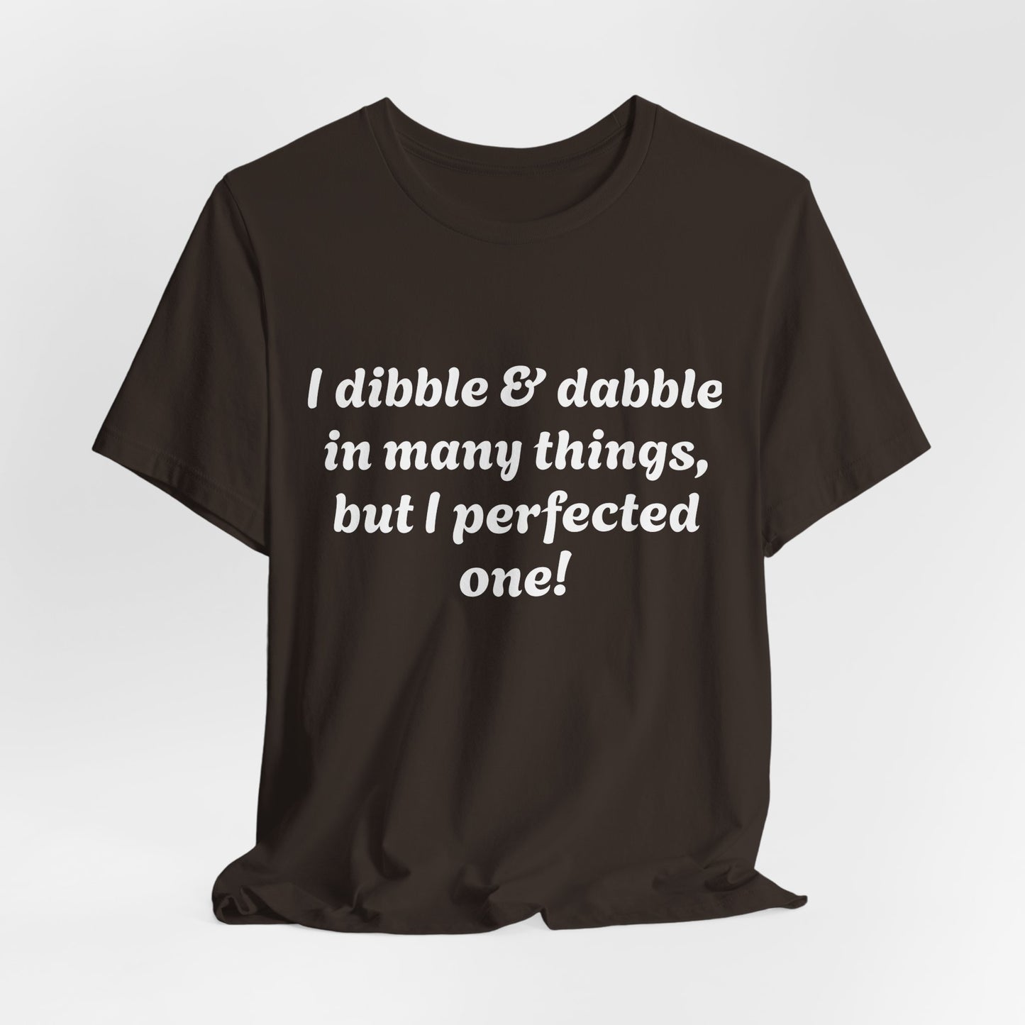 Minding My Business Tee — “I dibble & dabble in many things, but I perfected one!” Graphic T‑Shirt