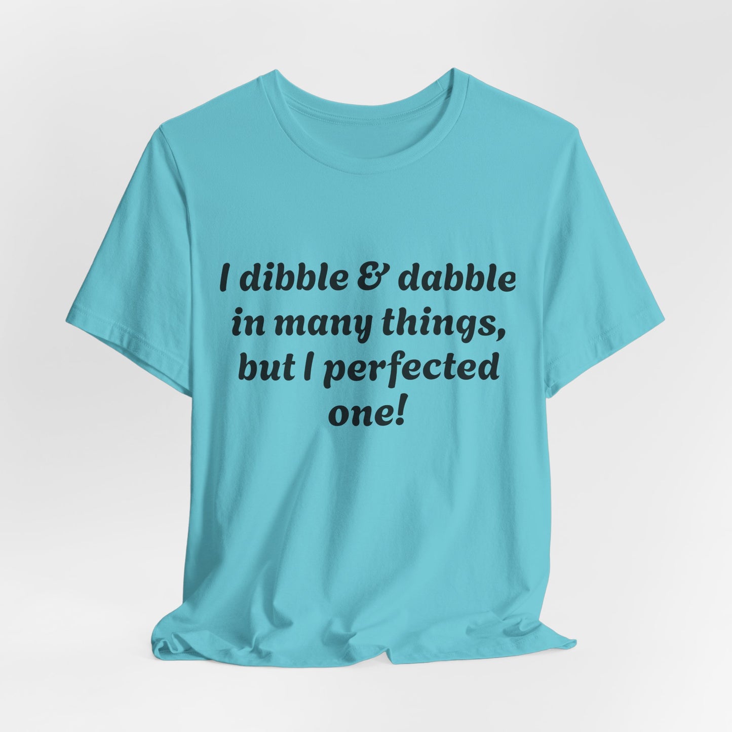 Minding My Business Tee — “I dibble & dabble in many things, but I perfected one!” Graphic T‑Shirt