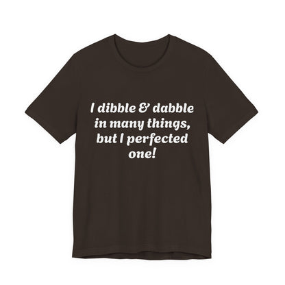 Minding My Business Tee — “I dibble & dabble in many things, but I perfected one!” Graphic T‑Shirt