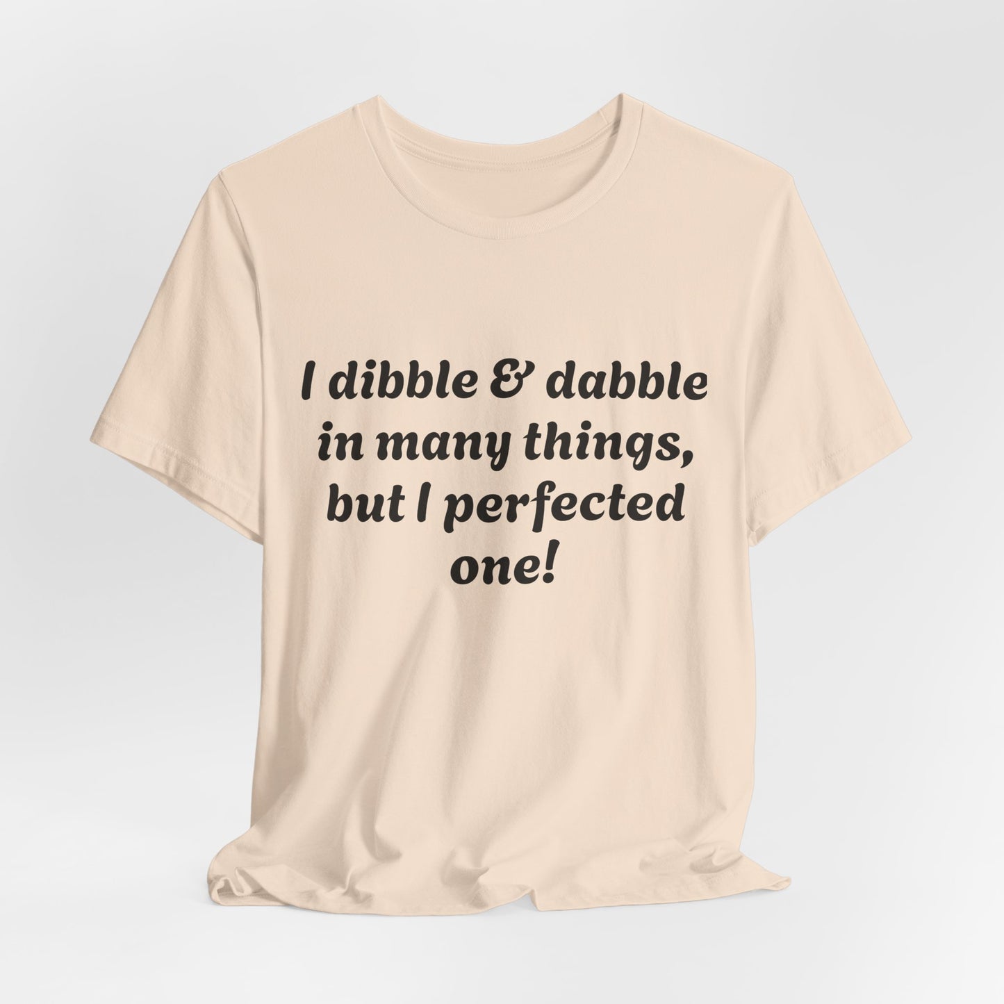 Minding My Business Tee — “I dibble & dabble in many things, but I perfected one!” Graphic T‑Shirt